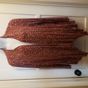 Lori Goldstein peplum cardigan with fall leaves print.